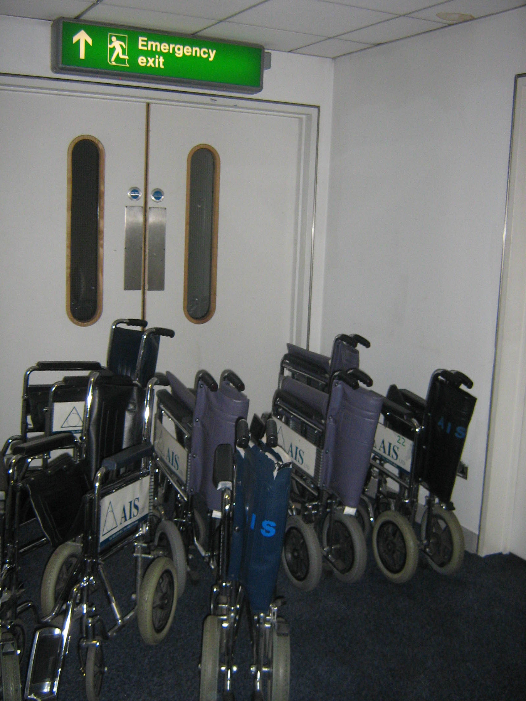 Wheelchairs located near to a fire exit